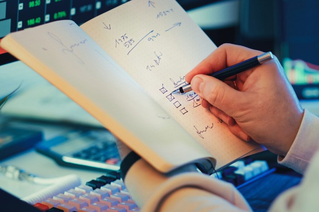 Person visualizing financial abundance while planning goals