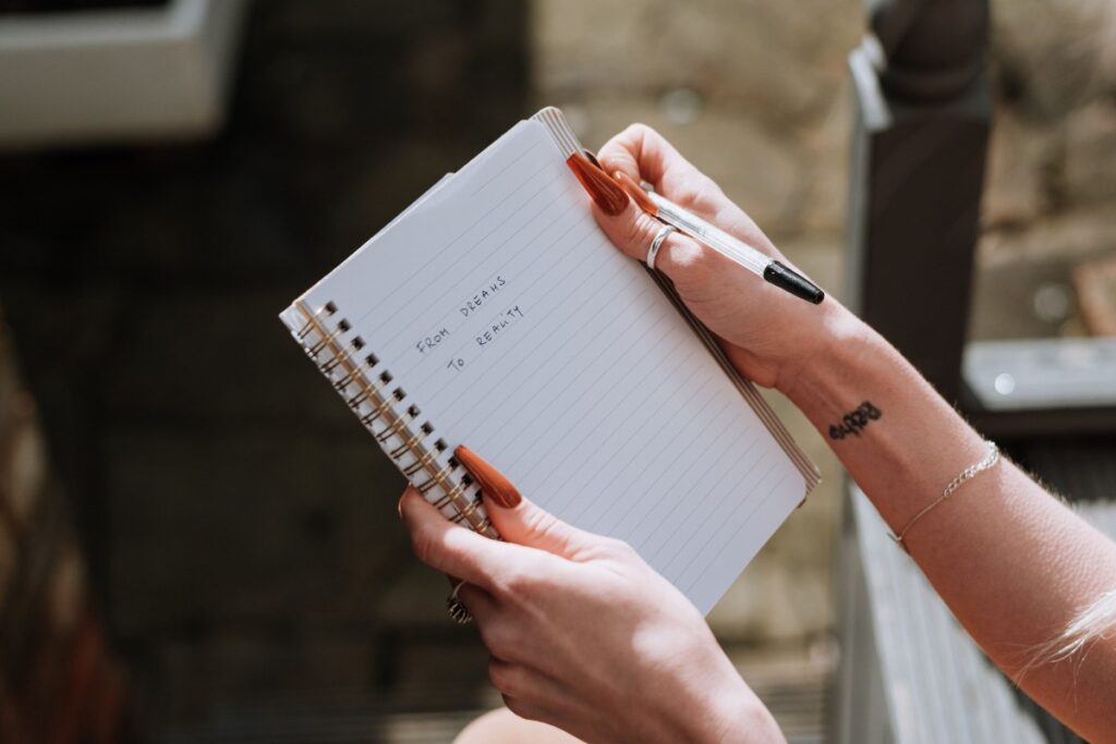 Writing down limiting beliefs and replacing them with positive thoughts