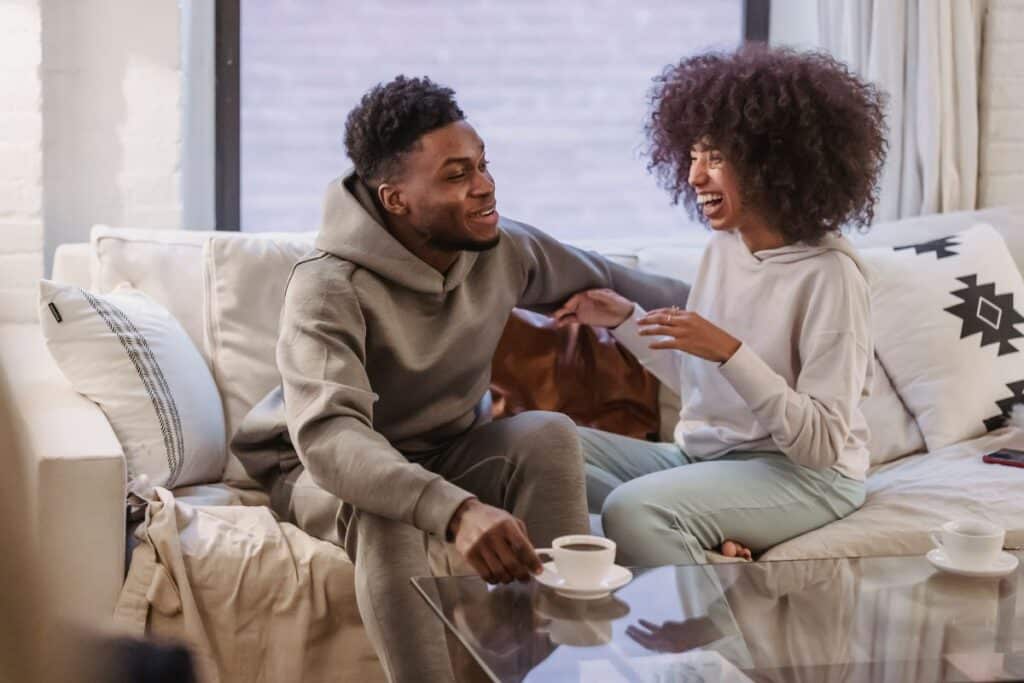 Couple sitting together representing the love tarot spread that gives clarity on any relationship